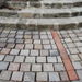 Terrasse en pavés de grès et briques de Vaugirard.